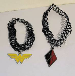 lot 111 image: WONDER WOMAN AND HARLEY QUINN CHOKERS