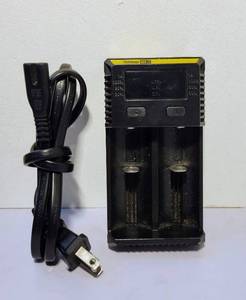 lot 127 image: NITECORE RECHARGABLE BATTERY CHARGER