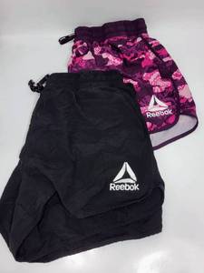 lot 214 image: 2 PAIRS OF WOMENS REEBOK SHORTS SIZE XL BLACK & PINK CAMO