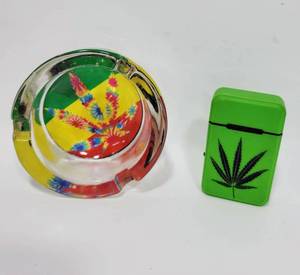 lot 224 image: DECORATIVE ASHTRAY AND REFILLABLE LIGHTER