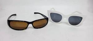 lot 29 image: 2 PAIRS OF SUNGLASSES - 1 SAYS RALPH ON THE SIDE