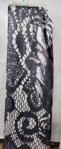 lot 332 image: PRETTY BLACK AND WHITE SHOWER CURTAIN WITH LINER AND GLIDE RINGS
