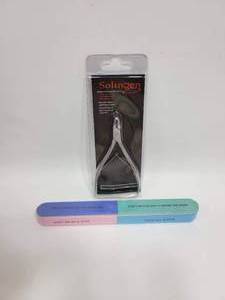 lot 379 image: NEW SEALED CUTICLE CLIPPER AND NAIL FILEBUFFER FOR NATURAL NAILS