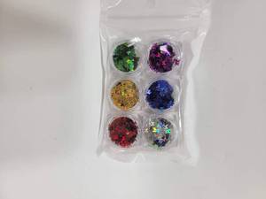 lot 382 image: NEW PACKAGE OF BUTTERFLY SHAPED GLITTER FOR ARTSCRAFTSNAILS