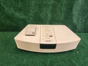 lot 323 image: Bose sound system with remote - no cords