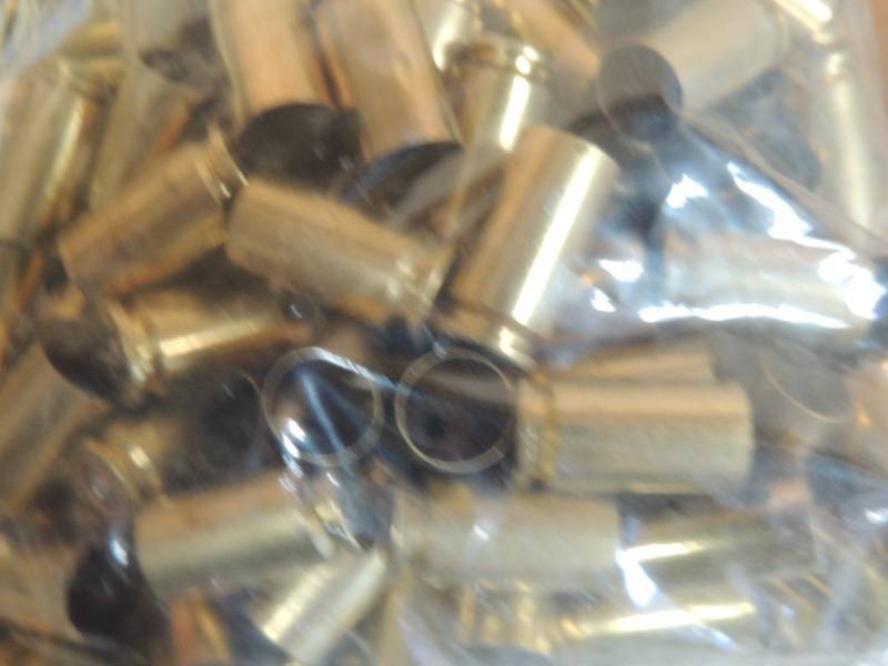 lot 1545 image: 40 S&W brass, 8 lbs per bag   x 4 b...