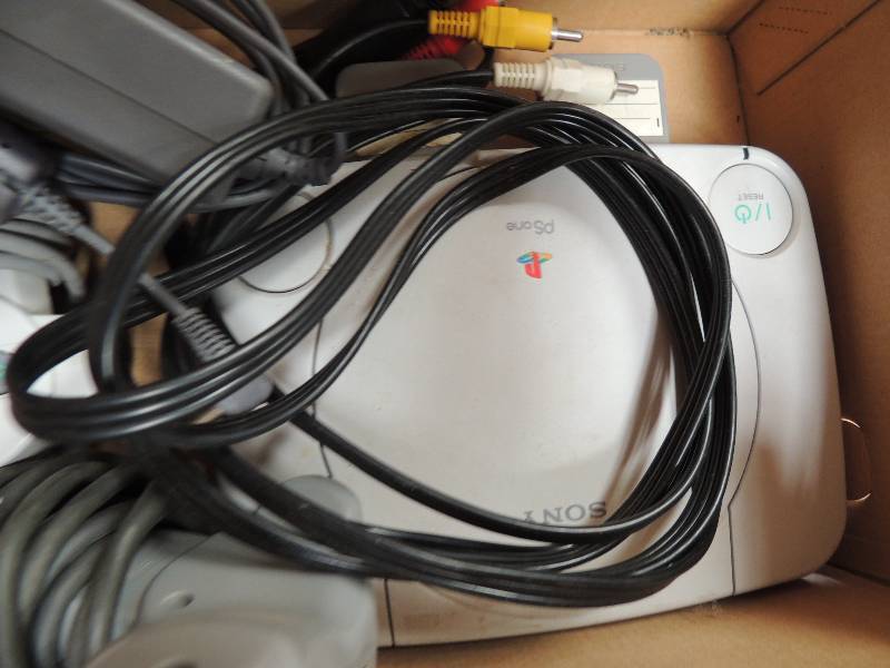 lot 1689 image: PS one with 2 controlers and 2 memo...