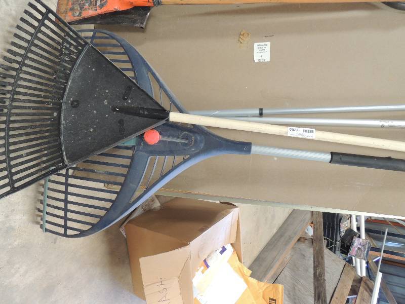 lot 1789 image: 2 plastic yard rakes and long sque...