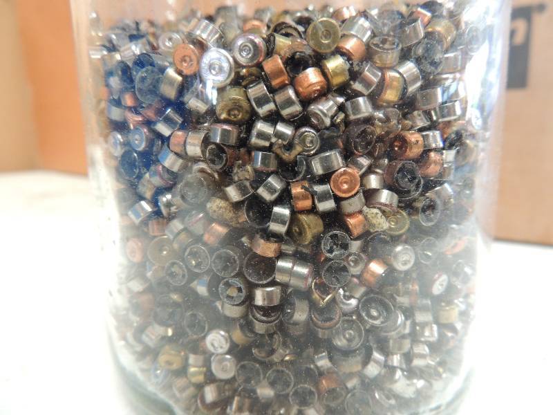 lot 1830 image: Jar of brass and silver primers...