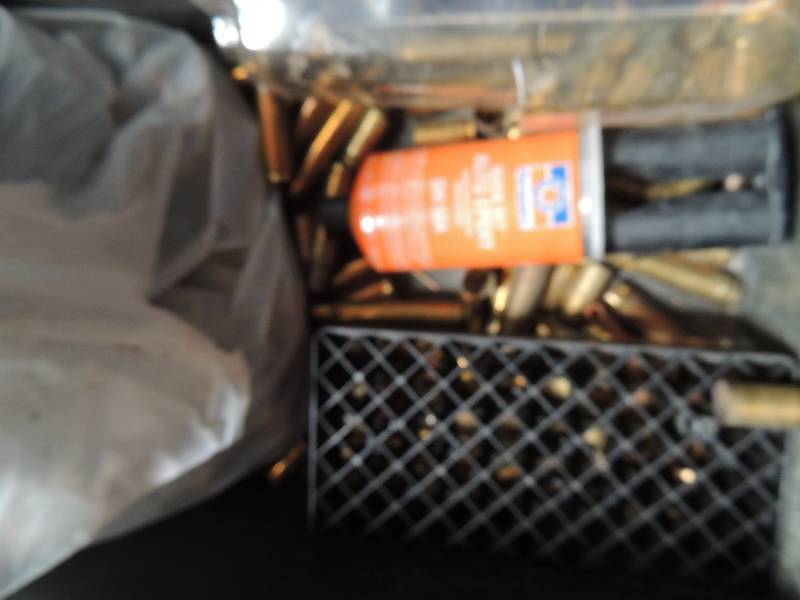 lot 681 image: Plastic Ammo box with various brass...