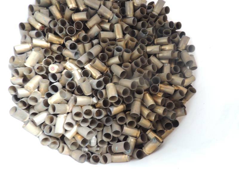 lot 708 image: Half a Barrel of 45 Cal Brass Casin...