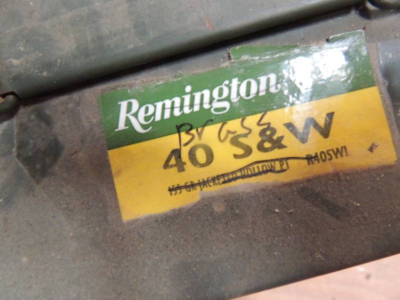 lot 715 image: Metal Ammo box 40 Cal Brass...