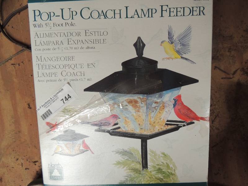 lot 744 image: Coach Bird feeder...