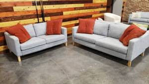 lot 2 image: Matching Blue Grey Sofa & Loveseat w Throw Pillows