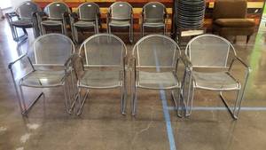 lot 20 image: Lot of 4 Industrial Style Stackable Metal Chairs