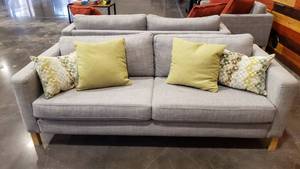 lot 25 image: Full Size Blue Grey Sofa w Throw Pillows