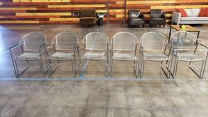 lot 17 image: Lot of 6 Industrial Style Stackable Metal Chairs