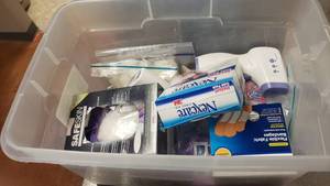 lot 308 image: Large Tote Full of Misc First Aid.  Bandaids, Infrared Thermometer & MUCH MORE