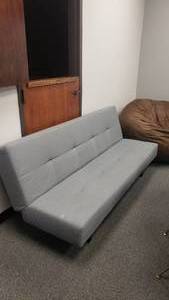 lot 346 image: Reclining Grey Sofa That Converts to A Bed.  74 Long