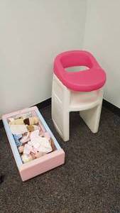lot 375 image: Lot of Toddler Play Items.  Doll Highchair, Doll crib & Misc Dolls