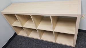 lot 392 image: Ikea Kallax Natural 8 Shelf Shelving Unit.  Measures 59 x 31 x 15