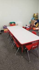 lot 395 image: Long Rectangle Adjustable Height Classroom Table w 8 Chairs.  72 Long