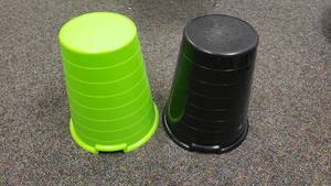 lot 396 image: Lot of 2 Ikea Evert Stacking Stools.  Black & Green