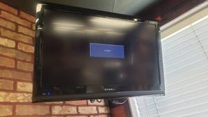 lot 256 image: Dynex 32 Television.  Model DX-32L150A11