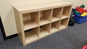 lot 499 image: Ikea Kallax Natural 8 Shelf Shelving Unit.  Measures 59 x 31 x 15
