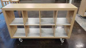 lot 549 image: Ikea Kallax Natural 8 Shelf Shelving Unit w ROLLERS.  Measures 59 x 31 x 15