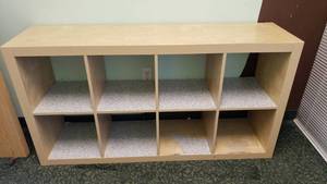 lot 565 image: Ikea Kallax Natural 8 Shelf Shelving Unit.  Measures 59 x 31 x 15
