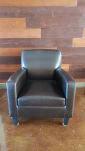 lot 591 image: Dark Brown Vinyl Deep Seat Lounge Arm Chair