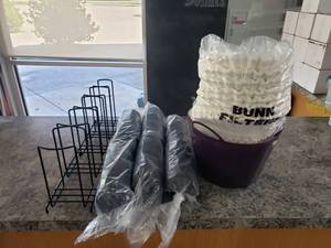 lot 617 image: Lot of Misc Coffee Supplies.  Filters, Lids & Cup Organizer