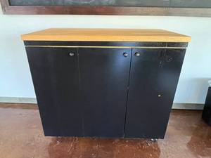 lot 630 image: Large Rolling Storage Cabinet w Butcher Block Top.  Measures 49 x 43 x 25.5