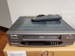 lot 703 image: BellHowell VCR w Remote, Model JSK 20931