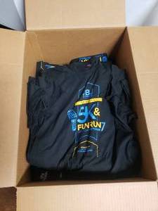 lot 704 image: Large Box Full of 5K Fun Run Shirts.  Adult & Youth Sizes