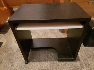 lot 728 image: Ikea Small Brown Rolling Desk