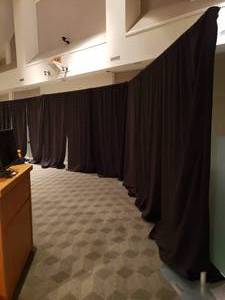 lot 814 image: Large Section of Curtain Backdrops or Privacy Panels.  Incloudes 9 Curtains, 4 Bases, 4 Posts, 3 Cross posts.  35 Long total
