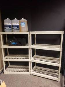 lot 930 image: Lot of 2 Plastic Garage Shelves.  Contents Not Included.