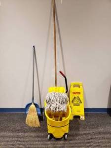 lot 946 image: Lot of Misc Cleaning Supplies.  Mop Bucket, Wet Floor Sign, Mop, Broom & More