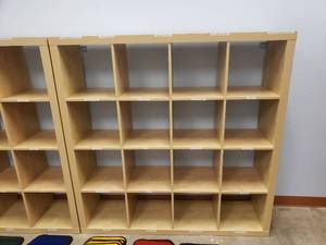 lot 978 image: Ikea Kallax Natural 16 Shelf Shelving Unit.