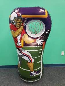 lot 1013 image: Island Genius Inflatable Football Toss Party Game