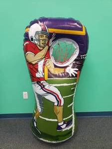 lot 1014 image: Island Genius Inflatable Football Toss Party Game