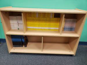 lot 1057 image: Large Lot of New Books.  Includes All Pictured.  Cabinet NOT Included.