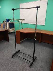 lot 1073 image: Rolling Clothes Rack
