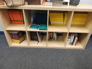 lot 1075 image: Large Lot of New Books.  Includes All Pictured.  Cabinet NOT Included.