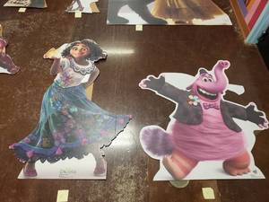 lot 1081 image: Lot of 2 Disney Cardboard Cutouts.  Mirabel (60) & Bing Bong (48).