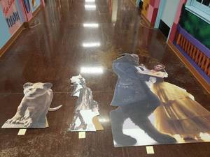 lot 1082 image: Lot of 3 Disney Live Action Cardboard Cutouts.  Belle & The Beast (85), Lumiere (49) & Young Simba (36)