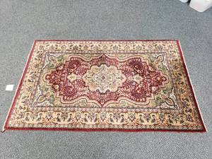 lot 1112 image: Area Rug.  Measures 78 x 49