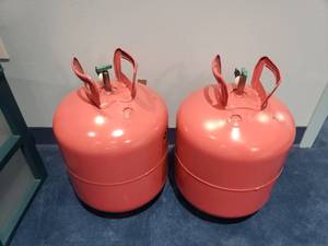 lot 1135 image: Lot of 2 Balloon Time Helium Tanks.  There is helium in both tanks though we arent sure how full they are.